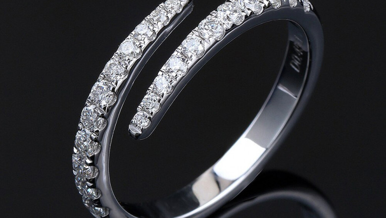 This Moissanite wedding band symbolizes lasting love and commitment