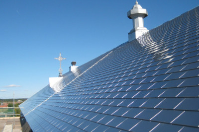 Metal Roof Over Shingles Installation.