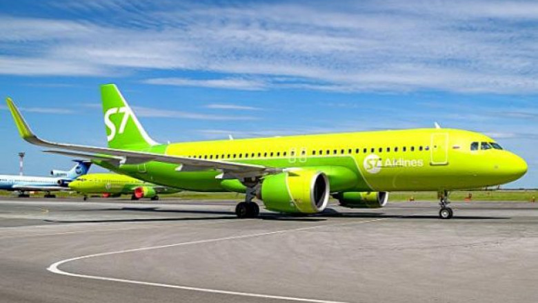 How much does it cost to transfer to business class S7?