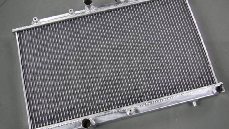 The automotive radiator helps to dissipate engine heat