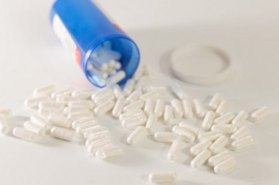 What causes lower back pain and, how can it be managed using naltrexone