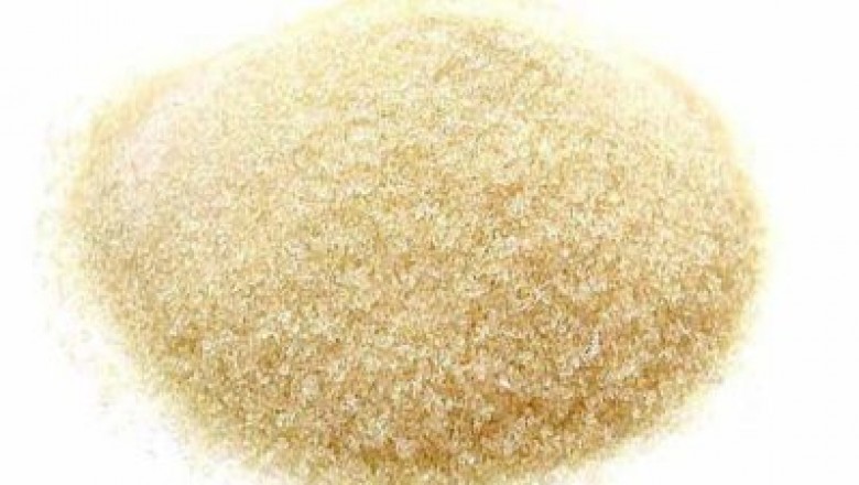 Gelatin or gelatine is a translucent, colorless, flavorless food ingredient, commonly derived from collagen taken from animal body parts.