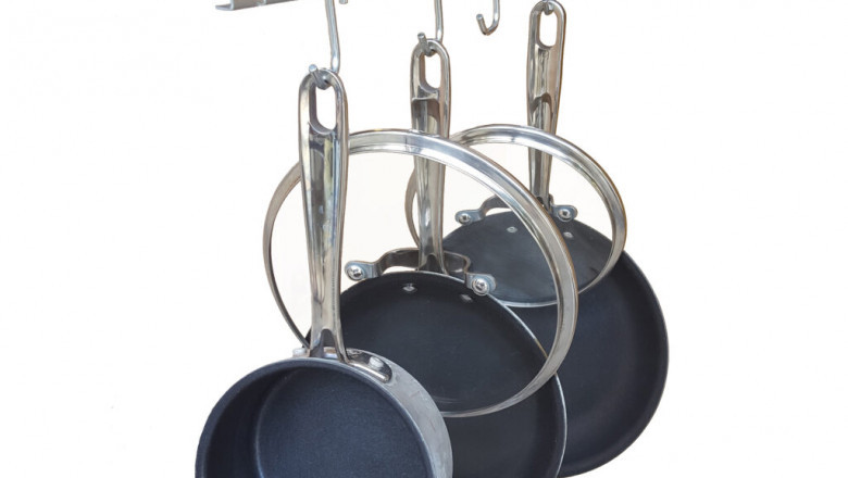 A Pull-Out Kitchen Organizer Reduces Cabinet Clutter