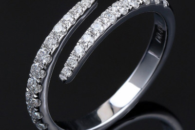 This Moissanite wedding band symbolizes lasting love and commitment