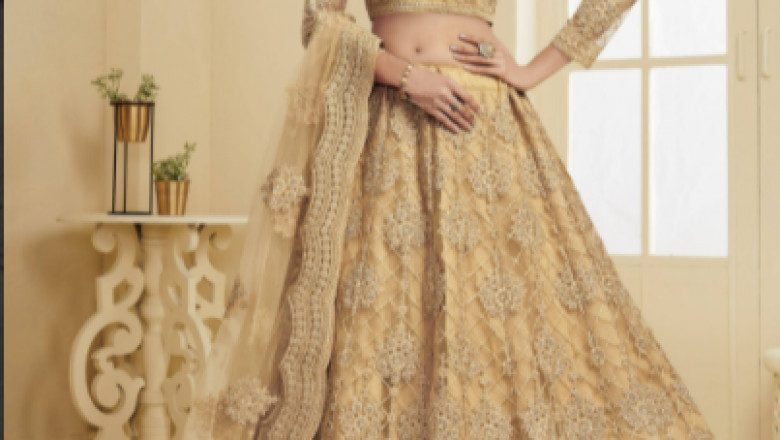 Buy Golden Coding Embroidery Net Bridal Wear Lehenga Choli Online from Ethnic Plus