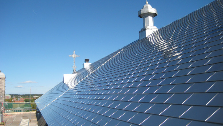 Metal Roof Over Shingles Installation.