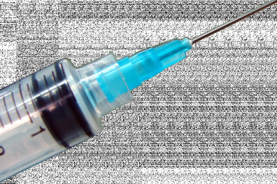 A Hypodermic Needles Penetrates The Skin Of The Patient At Its Tip With A Sharp Point.
