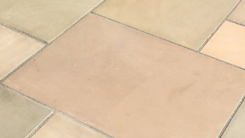 Why is sandstone becoming more popular as a paving material?