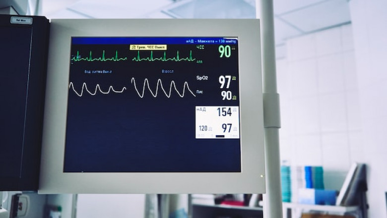 What does a patient monitor do in a hospital?