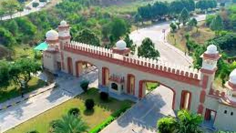 how to get property in Mangla Green Housing Pakistan?